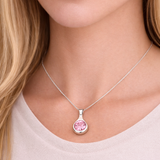 Tear drop Pendant with a pink cubic zirconia stone 