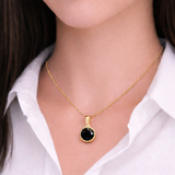 Tear drop shaped pendant with black cubic zirconia stone